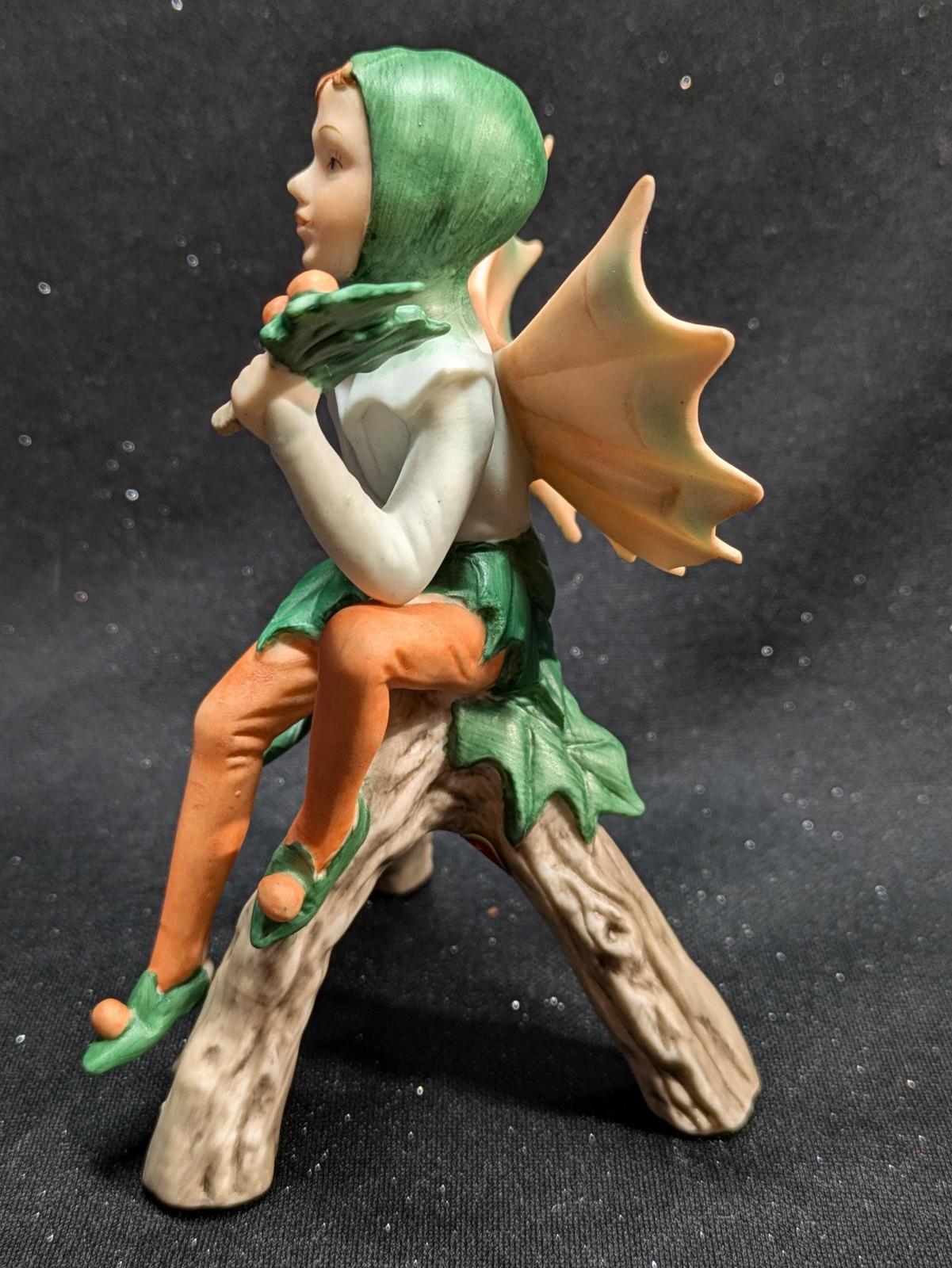 Delightful Porcelain Holly Fairy Figurine from the Cicely Mary Barker Flower Fairies™ Collection made in 1988