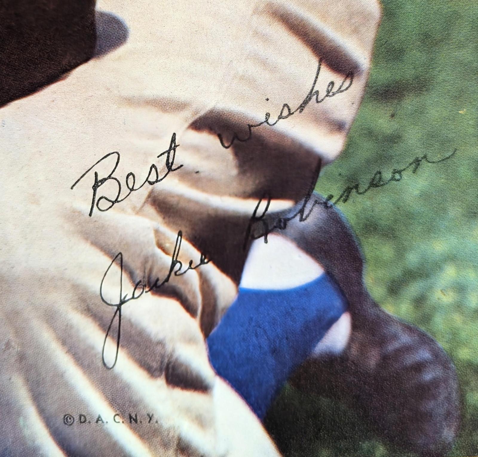 1953 calendar sample with image of Jackie Robinson. Features facsimile